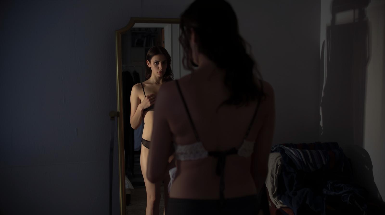A woman in simple undergarments